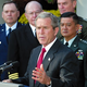 President Bush speaks to reporters about the growing crisis with North Korea, vowing to overthrow Saddam Hussein.
